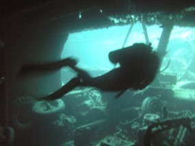 spooky diver inside the wreck